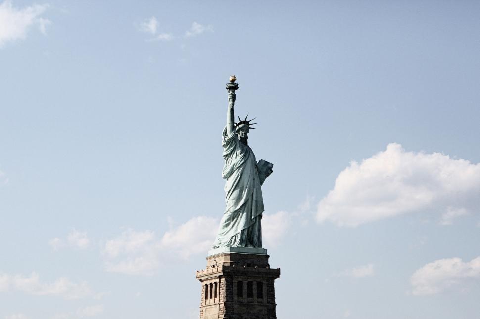 Free Image of The Statue of Liberty Stands Tall on a Clear Day 