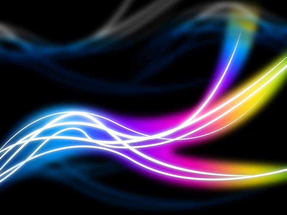 Free Image of Flourescent Swirls Background Shows Colorful Pattern In Dark  