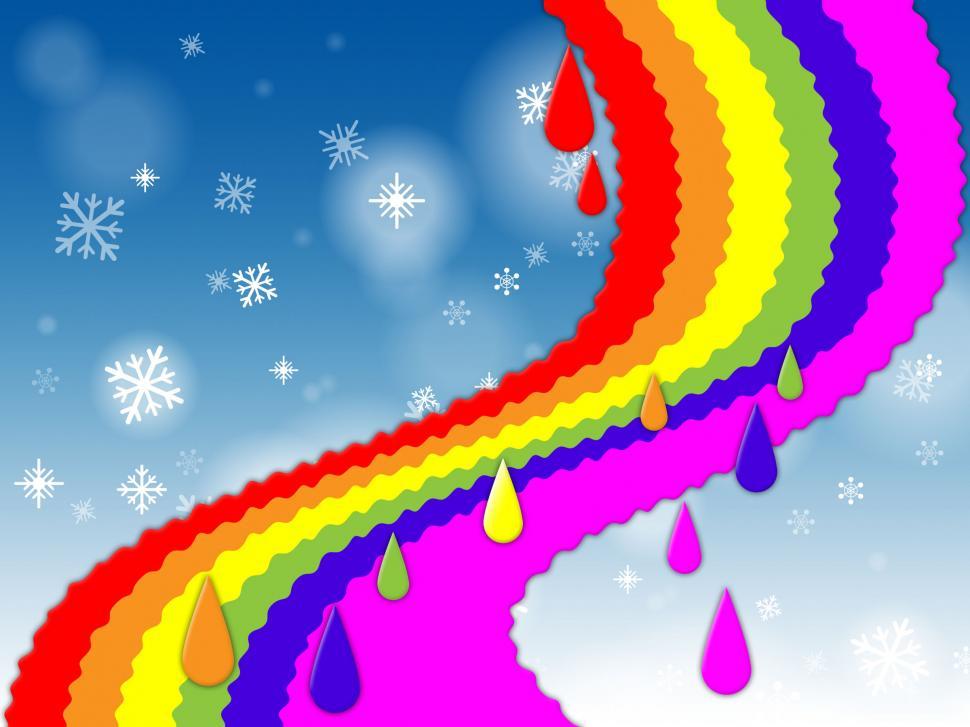 Free Image of Rainbow Background Shows Blue Sky And Snowing  