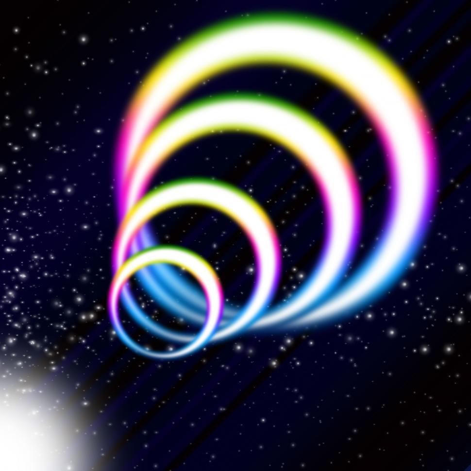Free Image of Rainbow Coil Background Means Colorful Rings And Starry Sky  