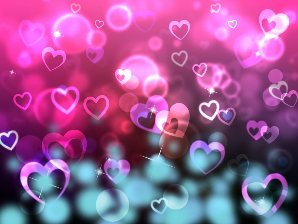 Free Image of Glow Bokeh Shows Heart Shapes And Backdrop 