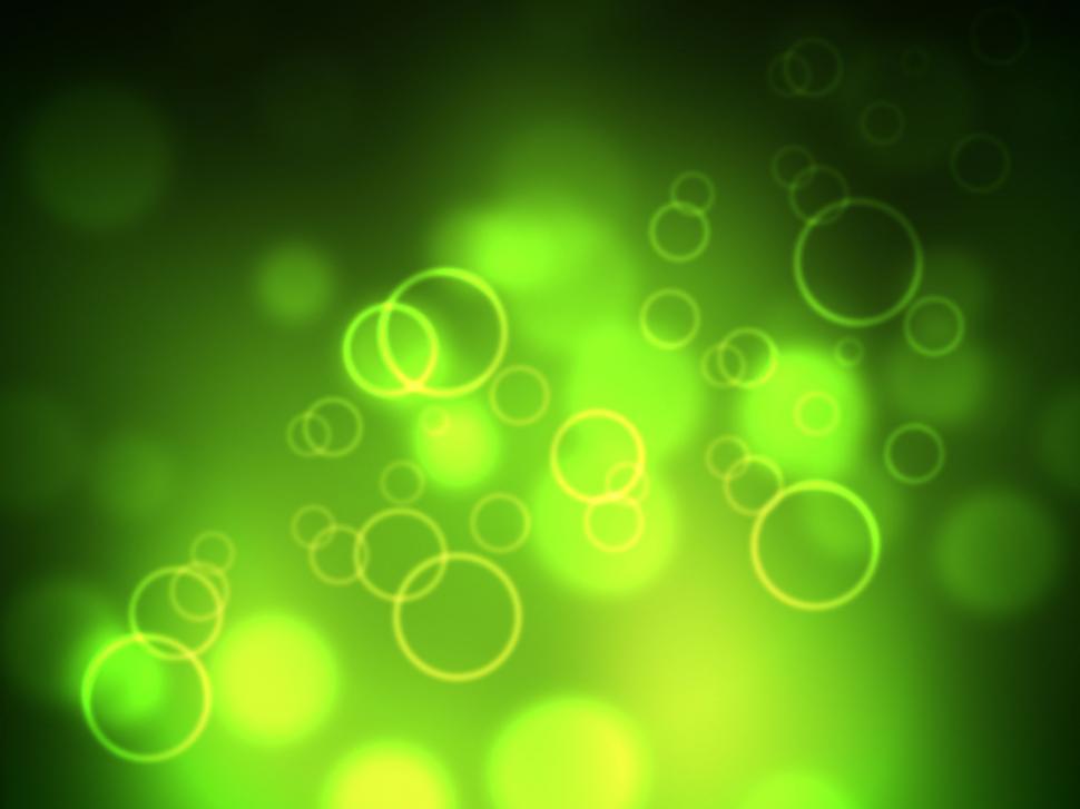 Free Image of Green Glow Shows Bokeh Lights And Backdrop 
