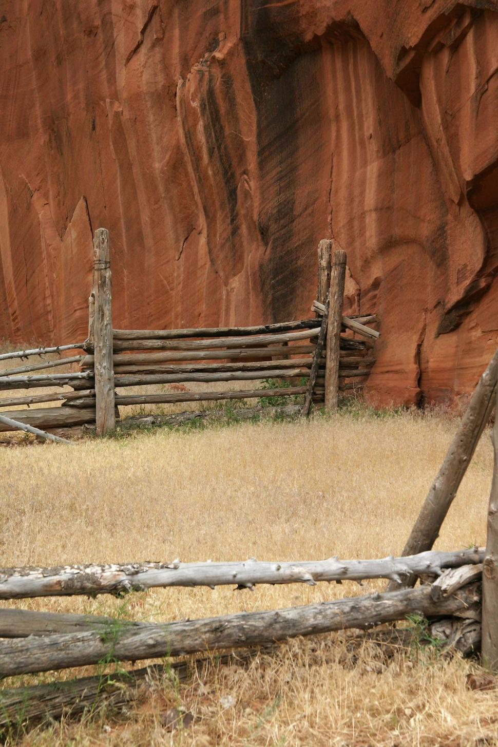 Free Image of cliff cliffs canyon de chelly chelly canyon de arizona indian native american monument national navajo southwest log rail fence corral grass dried weeds post ranch 