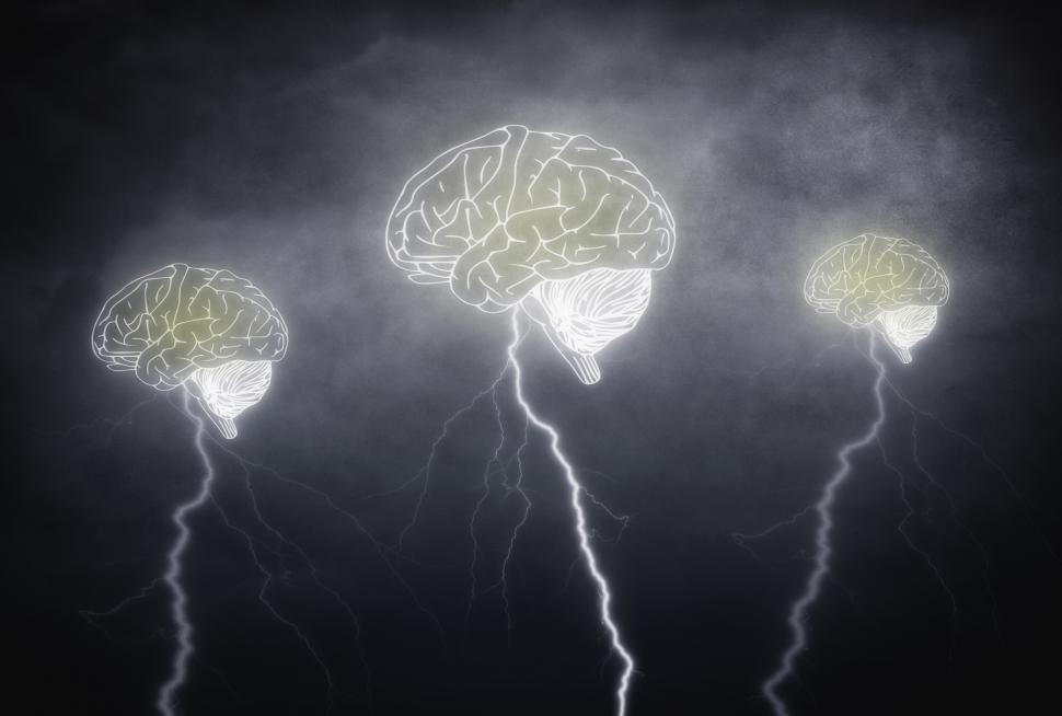 Free Image of Brainstorming - Three brains with thunderbolts on cloudy sky 