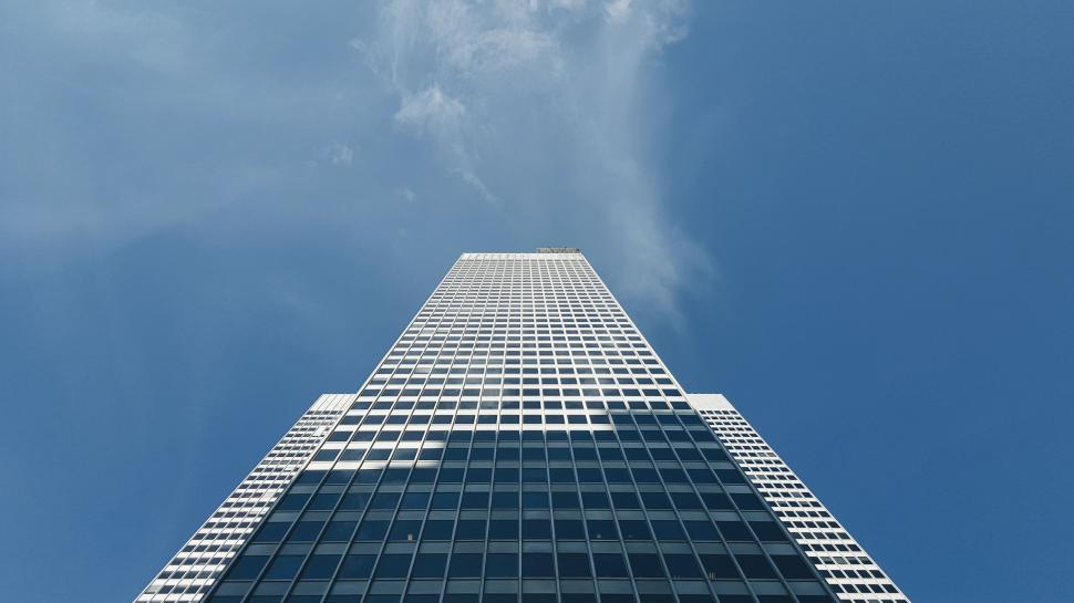 Free Image of Towering Skyscraper Against Sky 