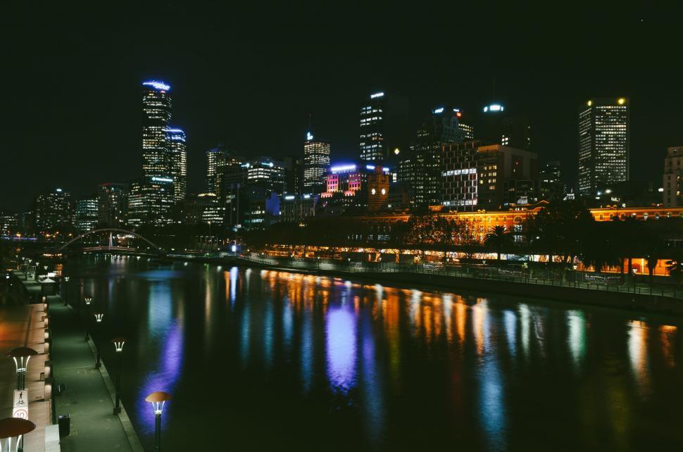 Free Image of City Skyline at Night Across the River 