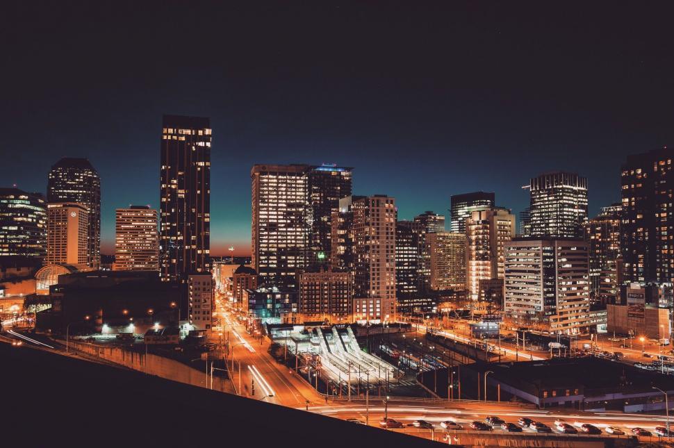 Free Image of Night View of a City With Tall Buildings 