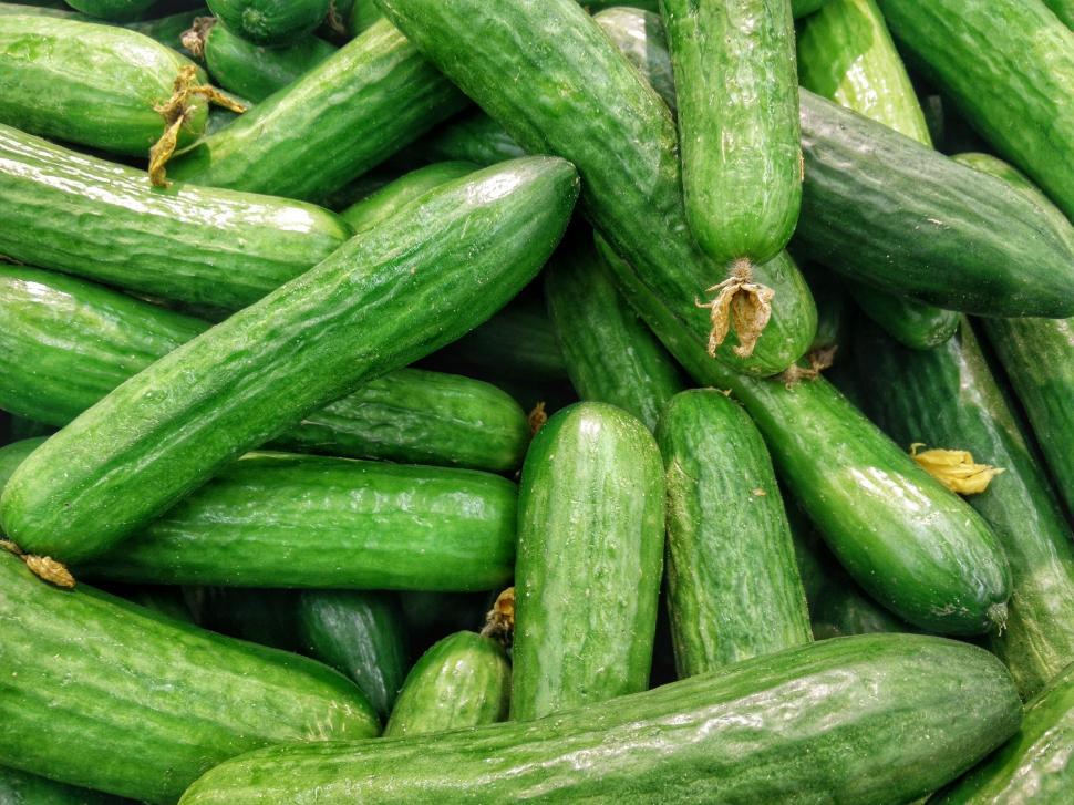 Free Image of A Pile of Cucumbers Next to Each Other 