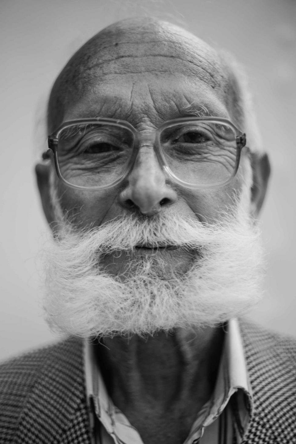 Free Image of Man With White Beard and Glasses 