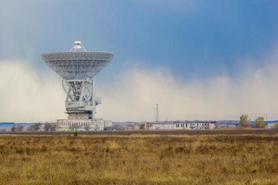 Free Image of Giant Radio Tower in Vast Field 