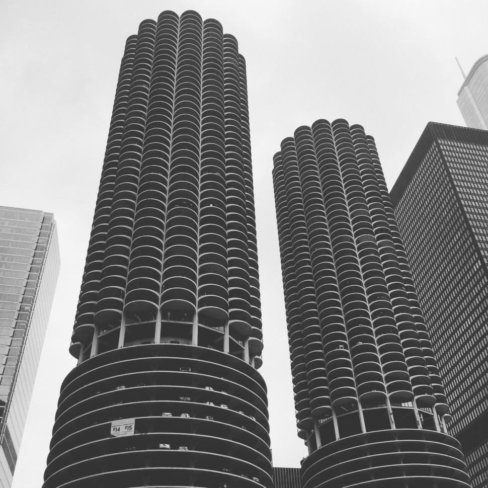 Free Image of Two Tall Buildings in Black and White 