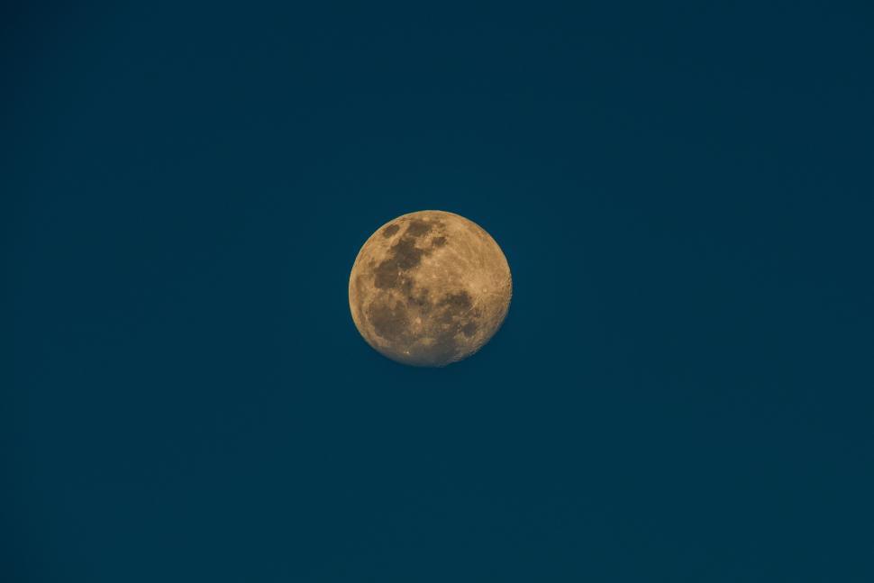 Free Image of Full Moon Illuminating Dark Blue Sky 