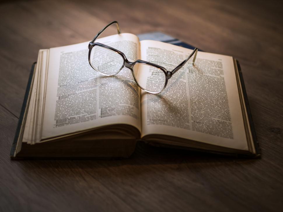 Free Image of Open Book With Glasses 