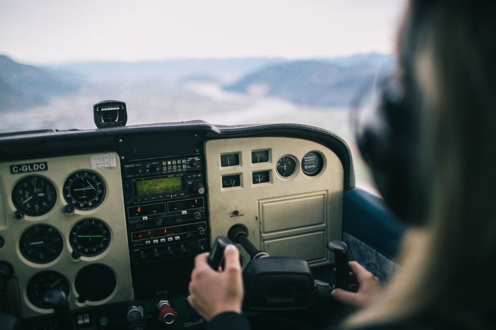 Free Image of Person Sitting in Cockpit of Plane 