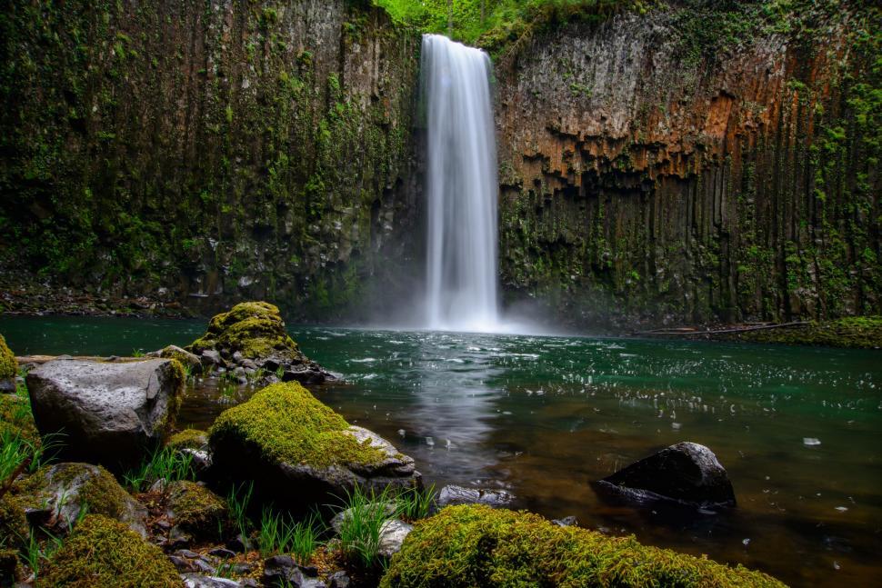 Free Image of Mossy Waterfall in a Rocky Setting 