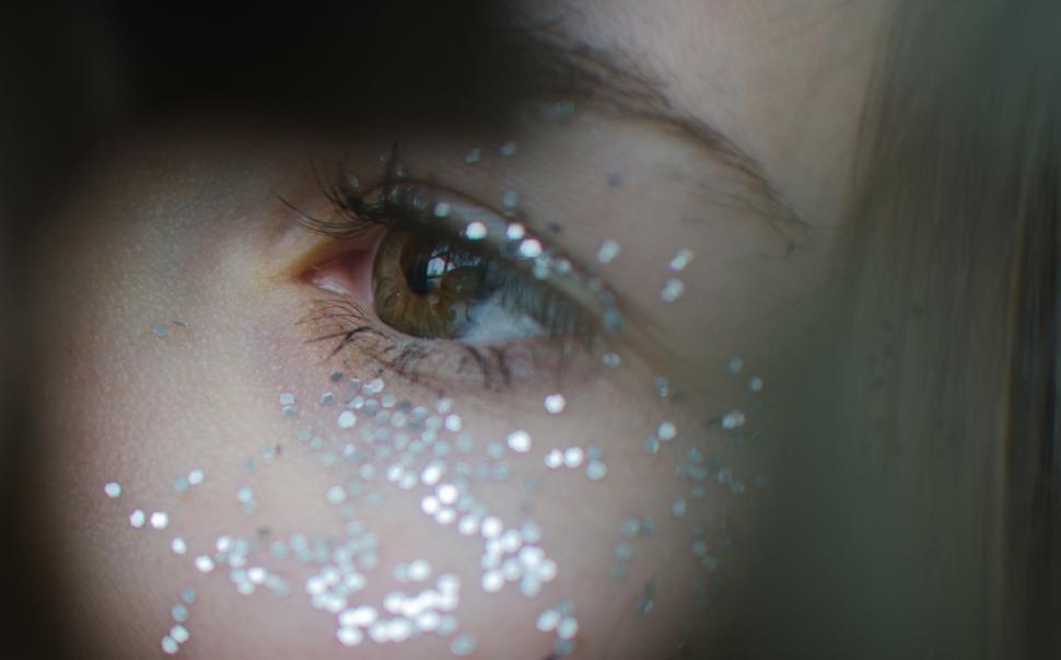 Free Image of Close Up Portrait of Persons Face Covered in Glitter 