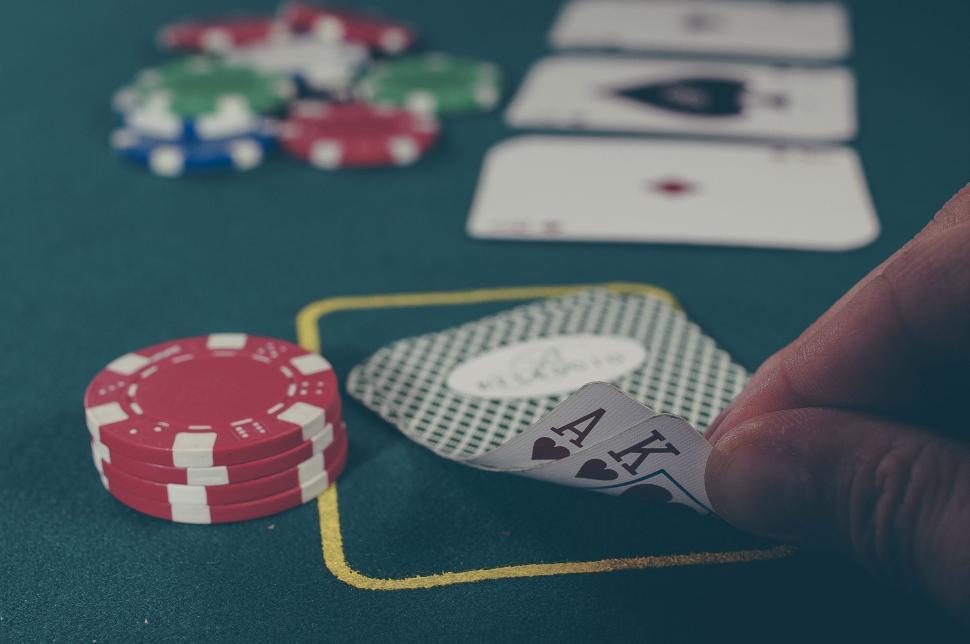 Free Image of A Person Playing a Game of Poker 