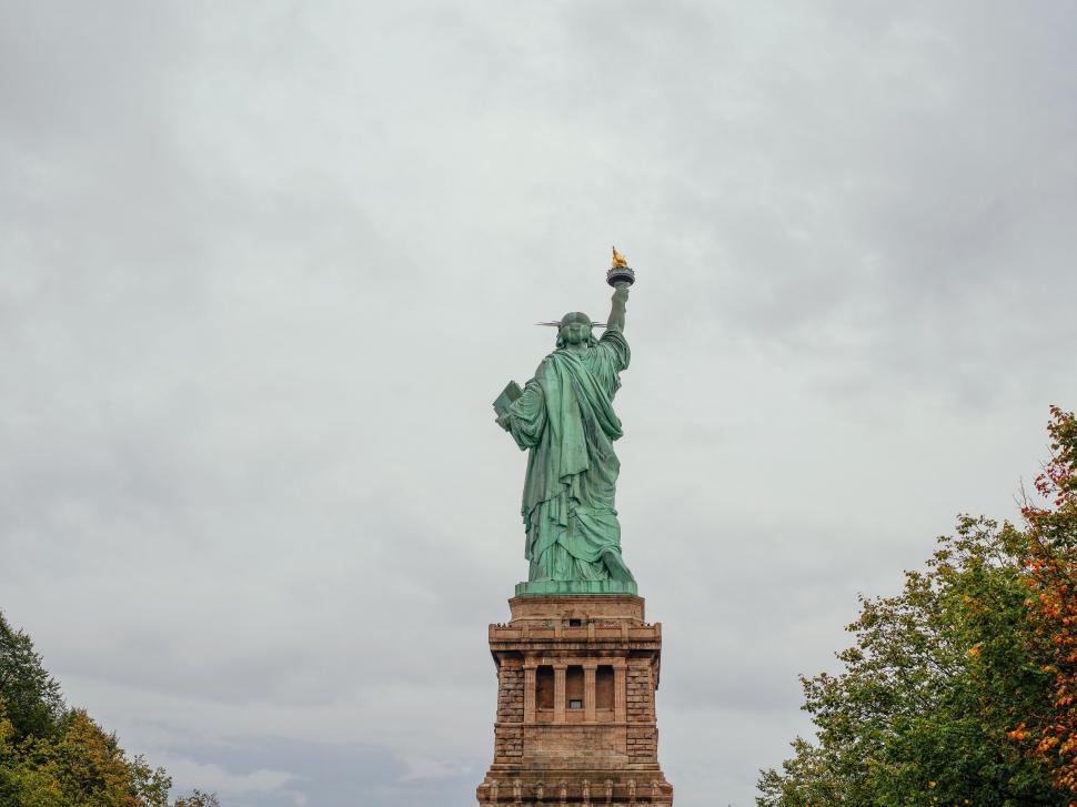 Free Image of The Statue of Liberty Amidst Trees 