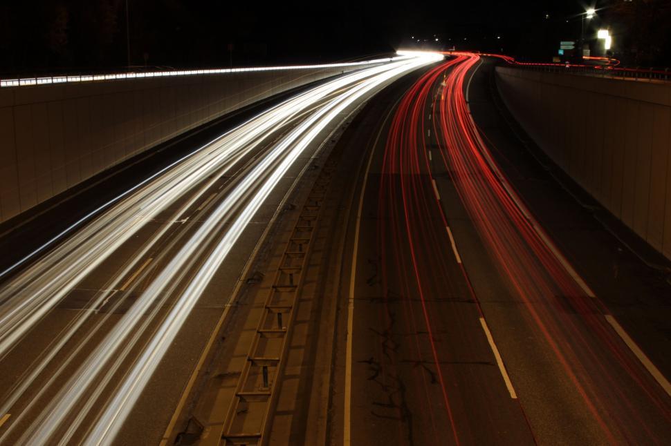 Free Image of Light Trails of Traffic on Busy Highway at Night 