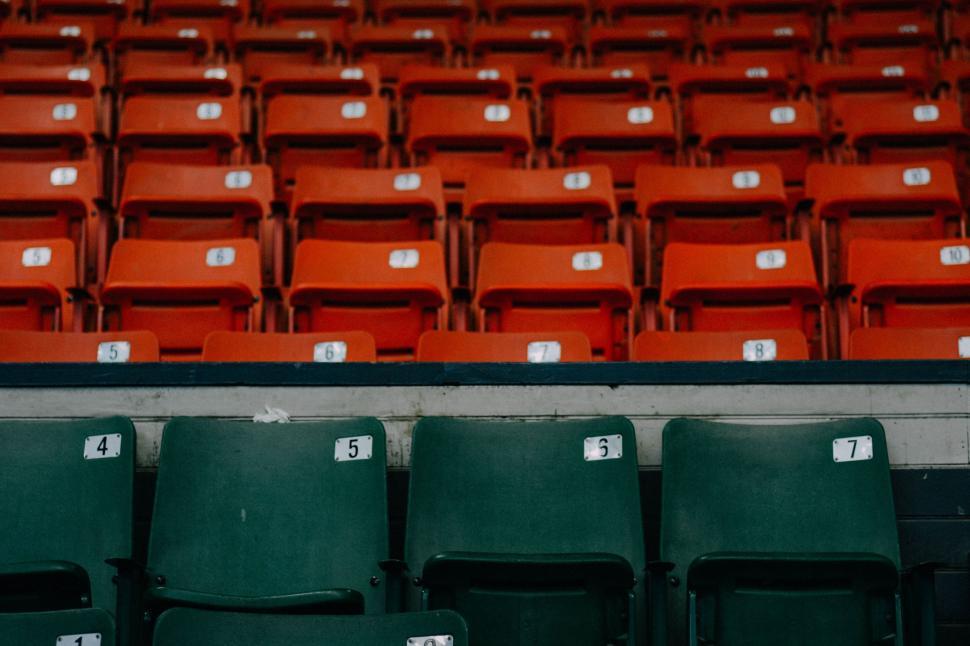Free Image of Row of Empty Seats in a Stadium 