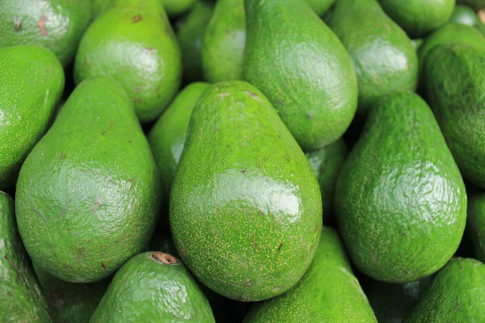 Free Image of A Pile of Green Avocados 