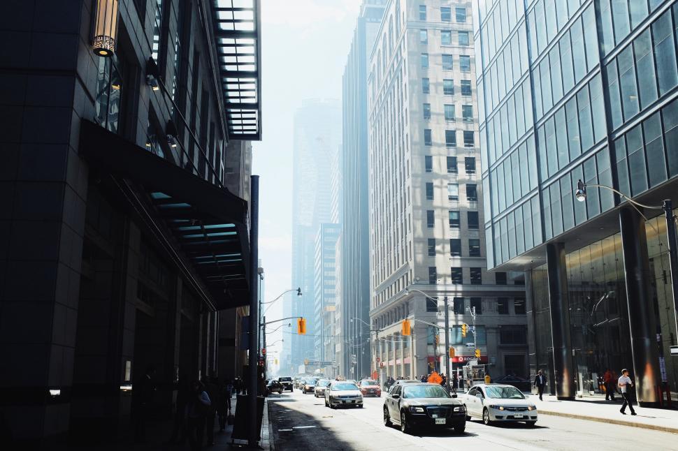 Free Image of Bustling City Street With Tall Buildings 