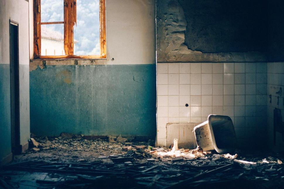 Free Image of Dirty Bathroom With Toilet and Window 