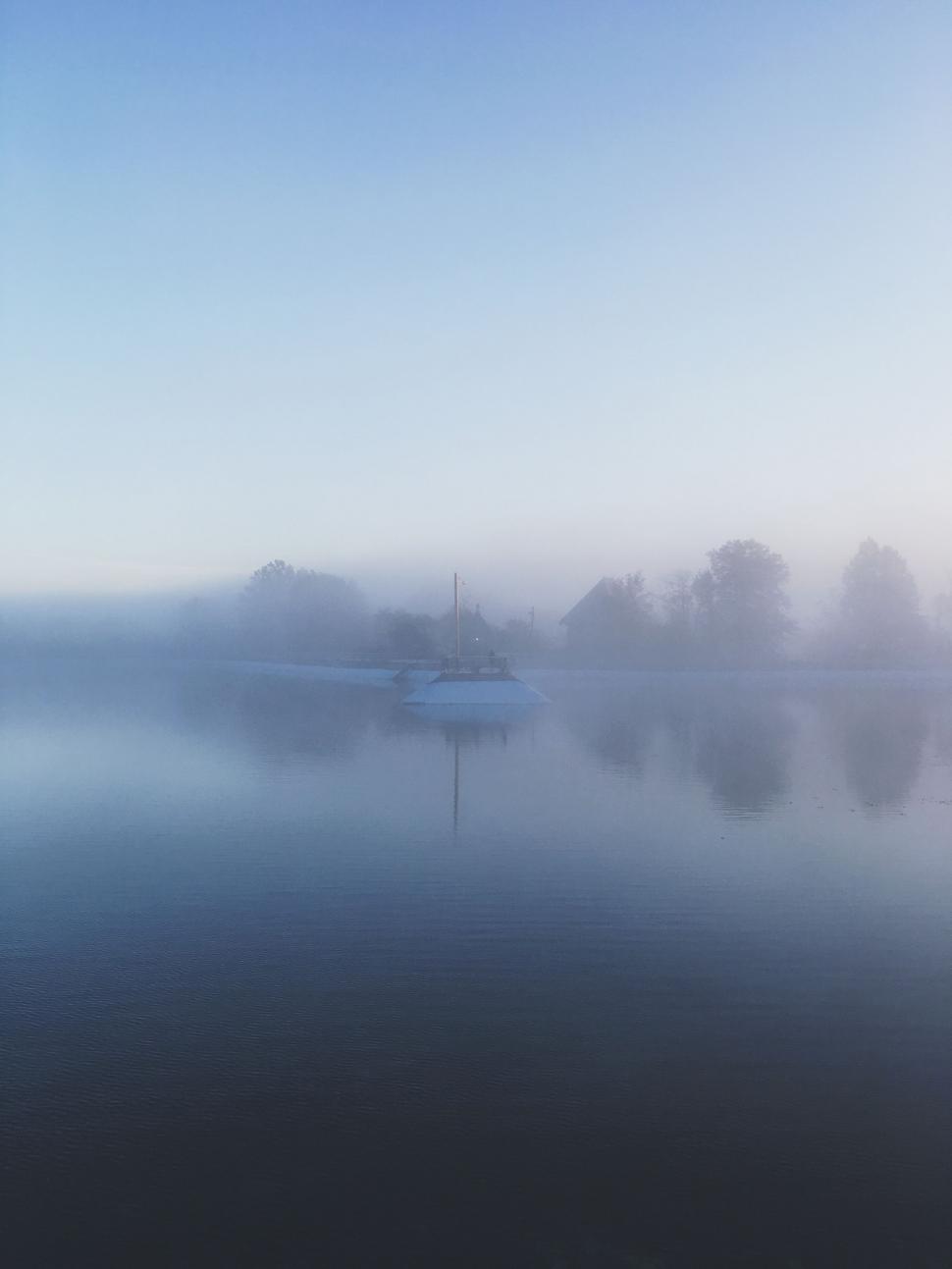 Free Image of Boat on a Foggy Lake 