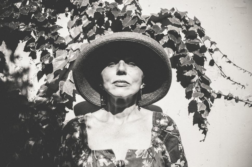 Free Image of Woman Wearing Hat With Leaves 