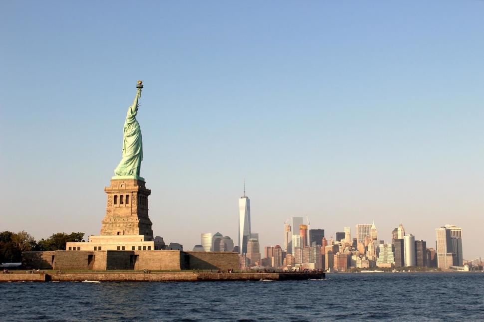 Free Image of Statue of Liberty Against City Skyline 