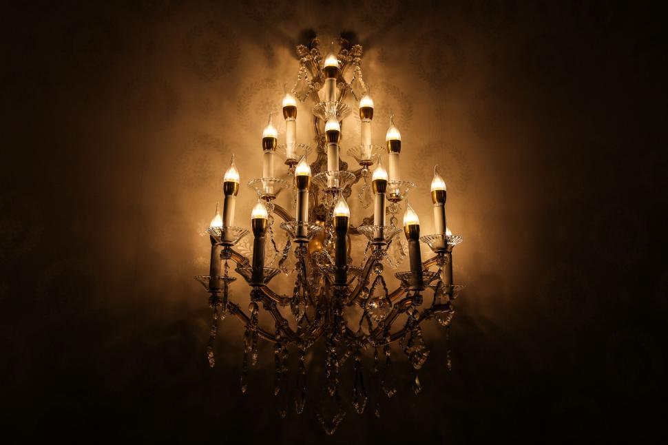 Free Image of Glowing Chandelier in Darkness 