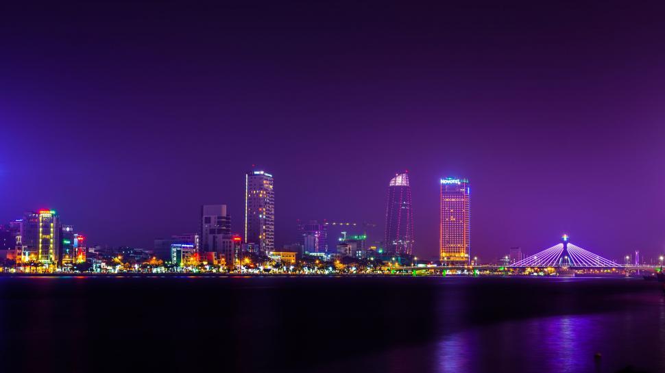 Free Image of Cityscape Lit Up Across the Water 