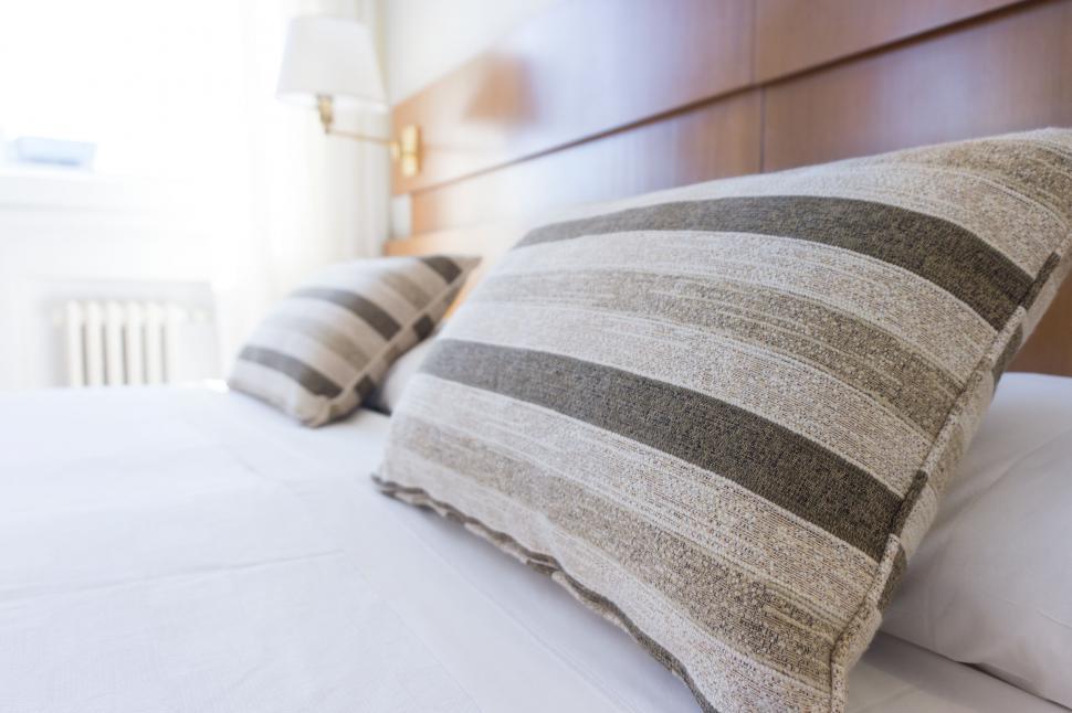 Free Image of Close Up of Bed With Two Pillows 