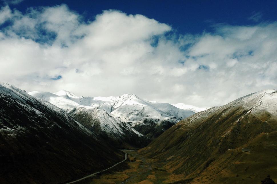 Free Image of Snow-Capped Mountain Range in View 