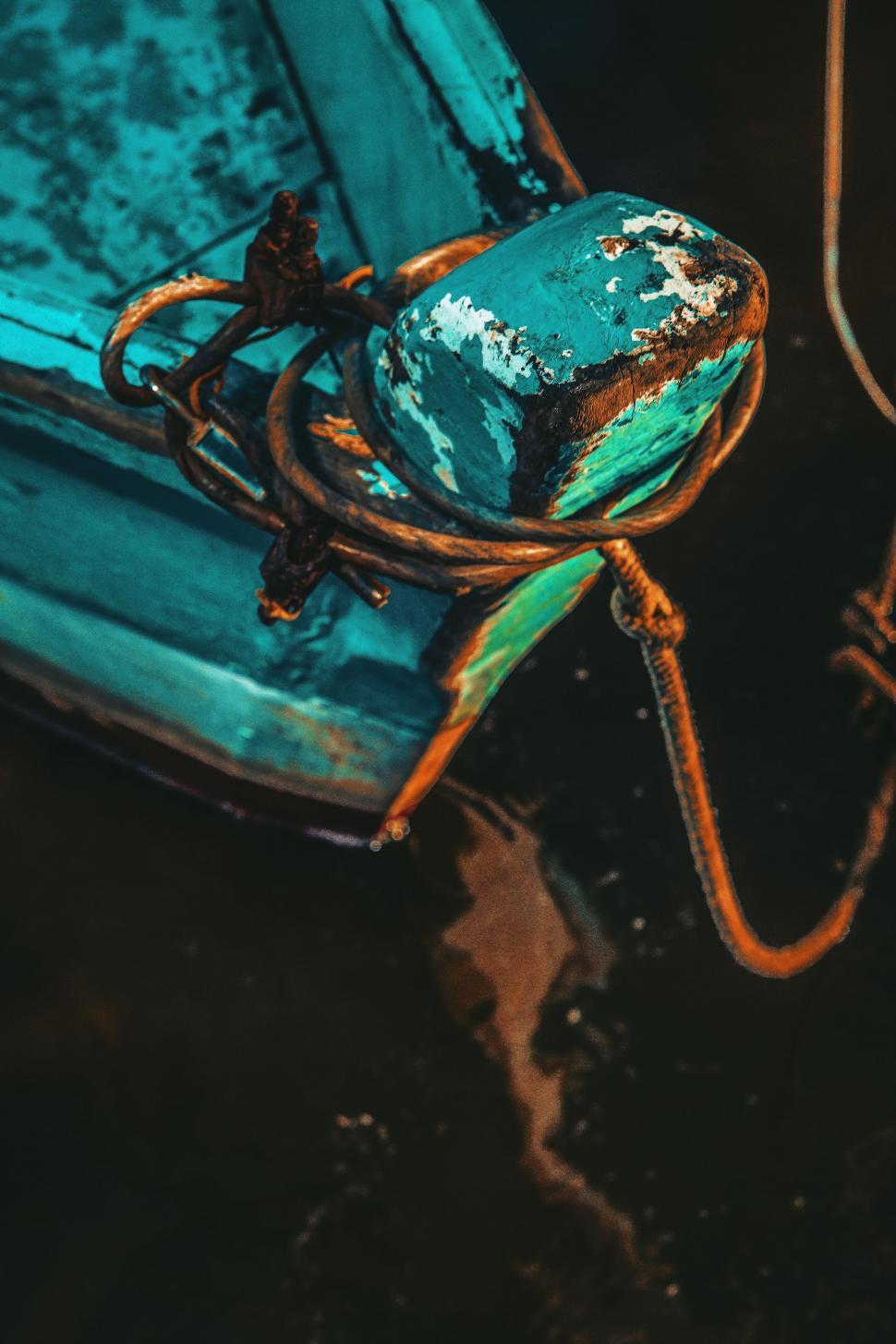 Free Image of Blue Boat With Rusted Rope 
