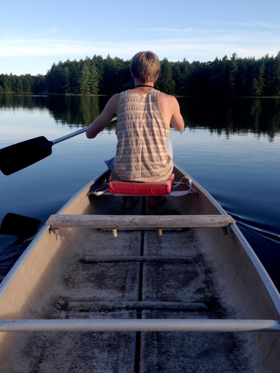 Free Image of Person Canoeing on Lake 