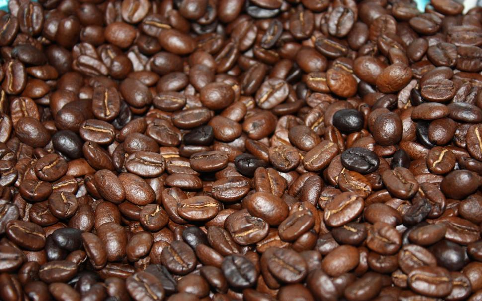Free Image of A Pile of Coffee Beans on a Table 