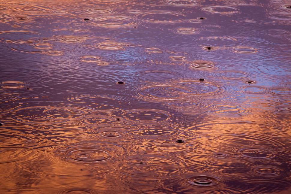 Free Image of Reflective Puddle of Water With Sky Background 