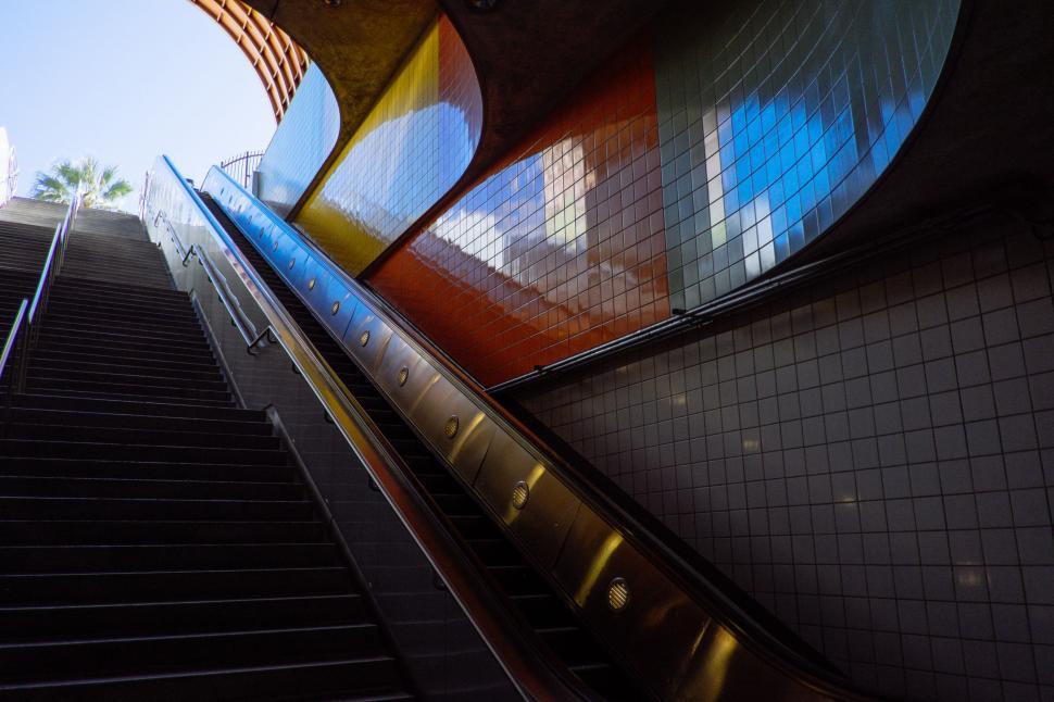 Free Image of Escalator in Building With Tiled Walls 