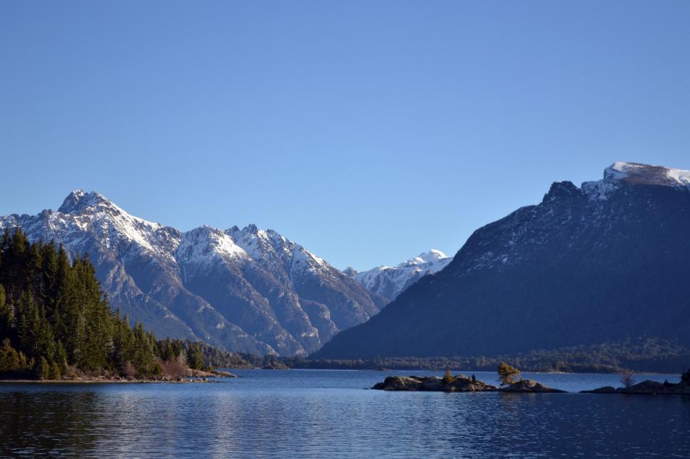 Free Image of Lake With Mountains in the Background 