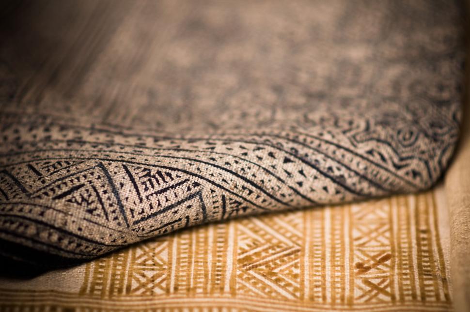 Free Image of Close Up of a Blanket on a Bed 