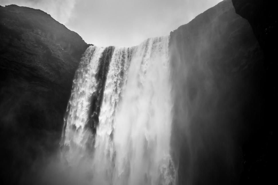 Free Image of Majestic Waterfall Cascading Down in Black and White 