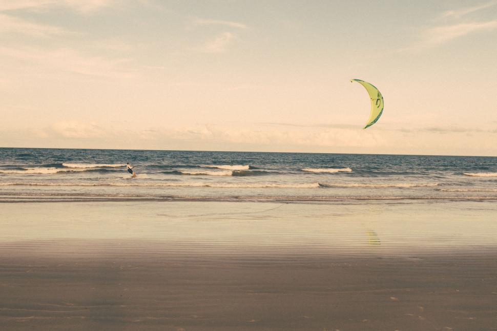 Free Image of Person Flying Kite on Beach 