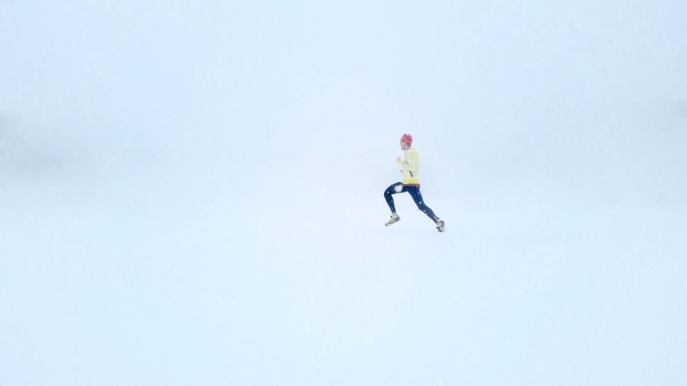 Free Image of Person Jumping In The Air On Skis In The Snow 