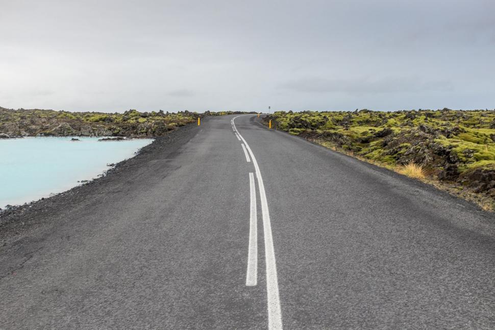 Free Image of Empty Road With Lake in the Middle 