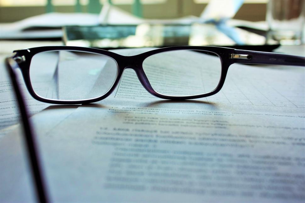 Free Image of Glasses Resting on Table 