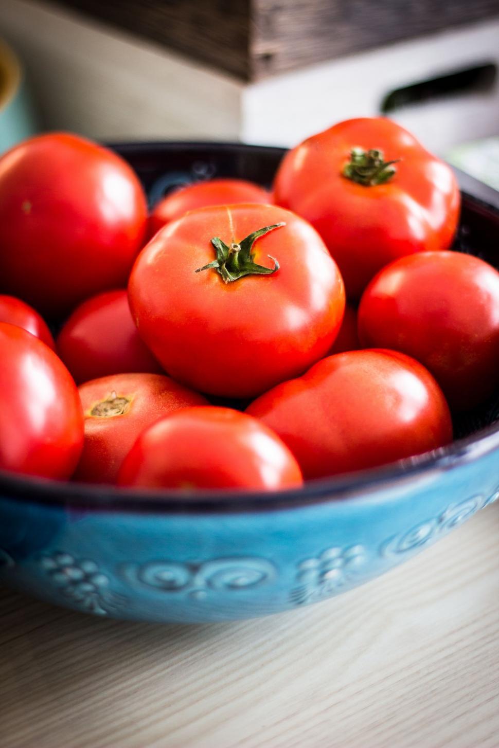 Free Image of Blue Bowl Filled With Red Tomatoes 