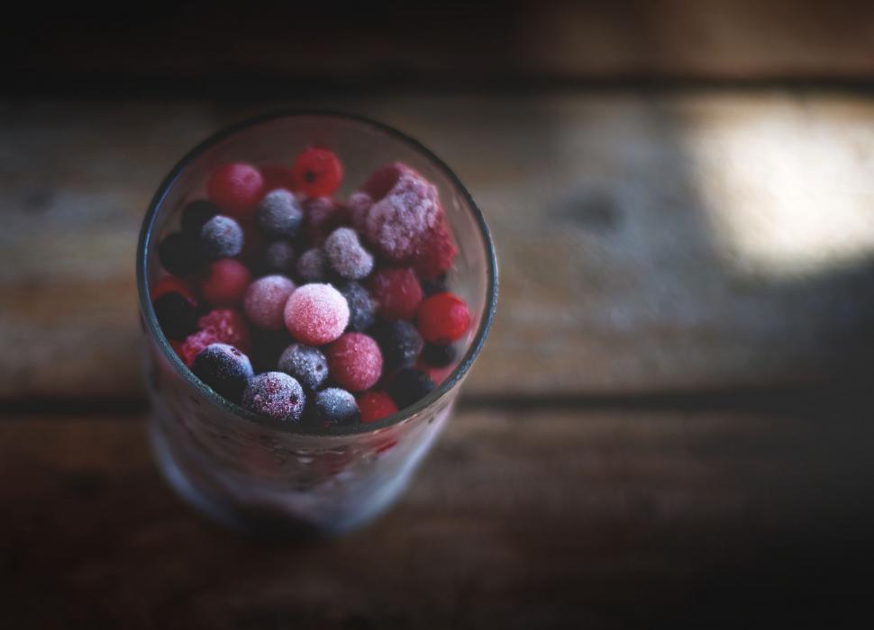 Free Image of Glass Filled With Raspberries and Blueberries 