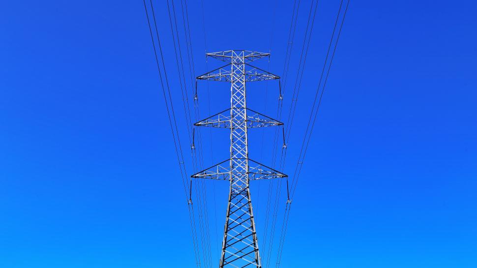 Free Image of Electric Pole Against Blue Sky 