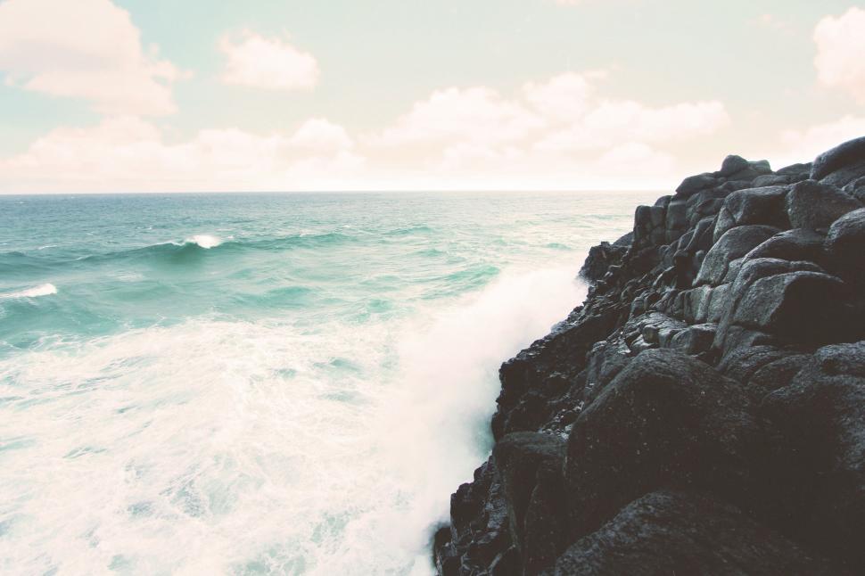 Free Image of Ocean Waves Crashing Against Rocks 